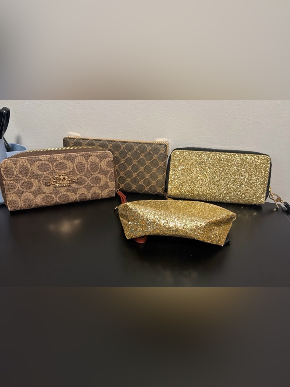 Gold makeup Bag and Wallet plus 2 other random brown wallets